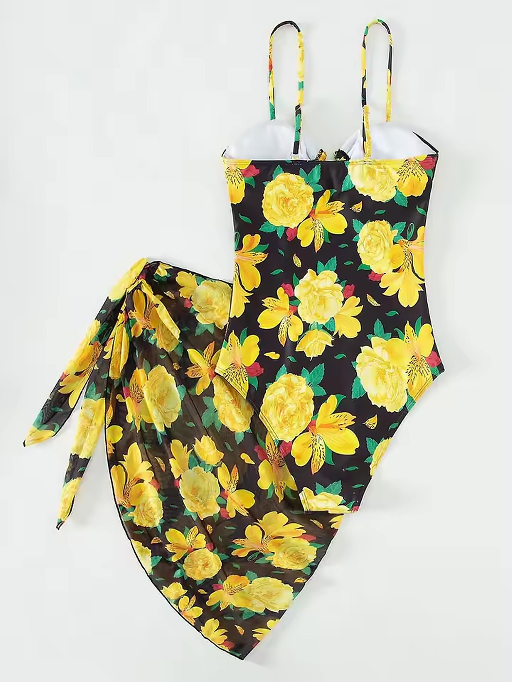Yellow floral bikini with black background, adjustable straps, and coordinating sarong wrap in vibrant botanical print.