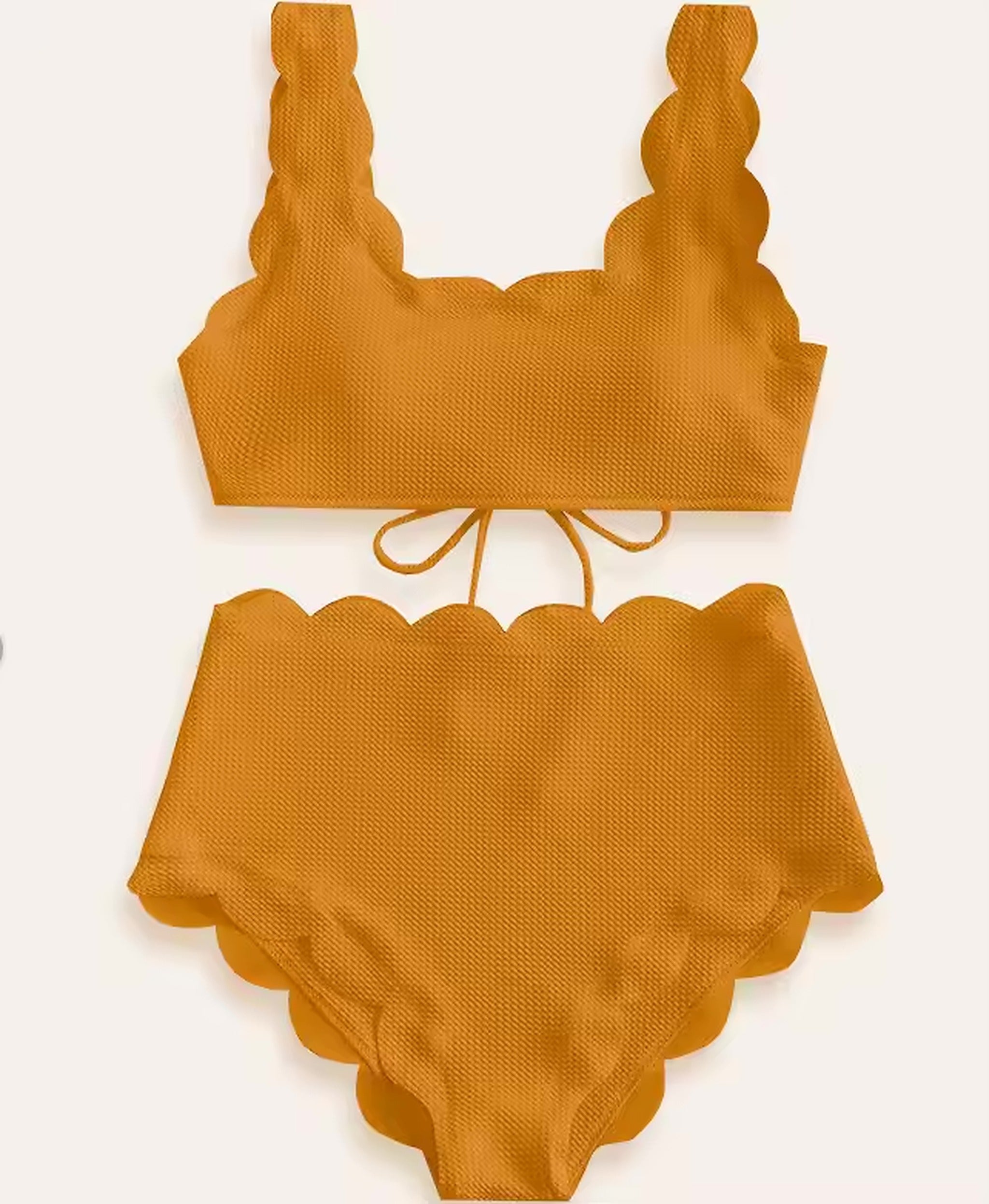 Golden yellow textured bikini with ruffled scalloped edges and adjustable tie straps on white background